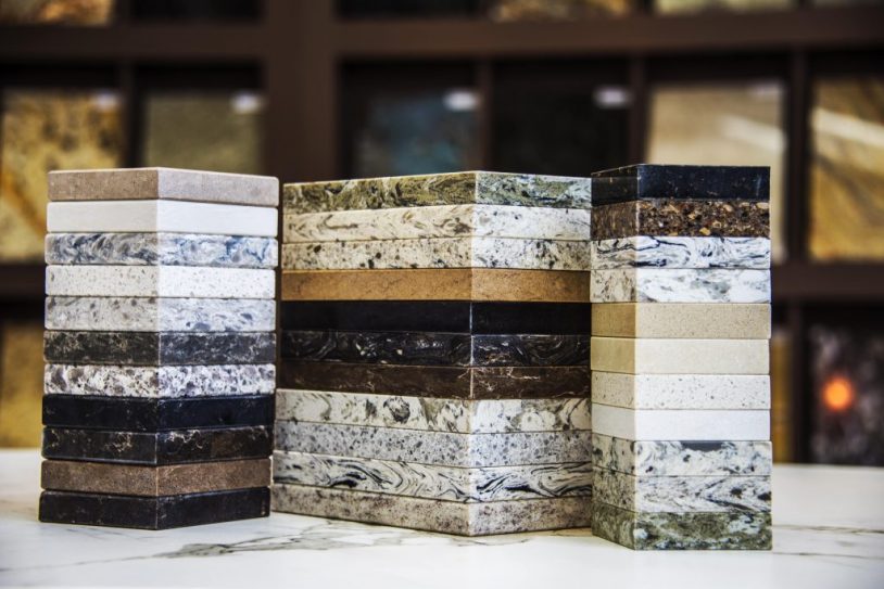 A close up of several different colored marble blocks.