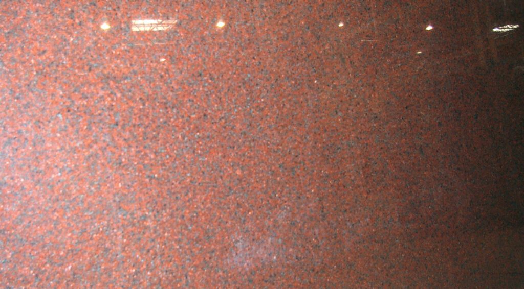 A close up of the red granite surface