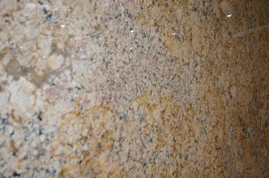 A close up of the granite wall in a room.