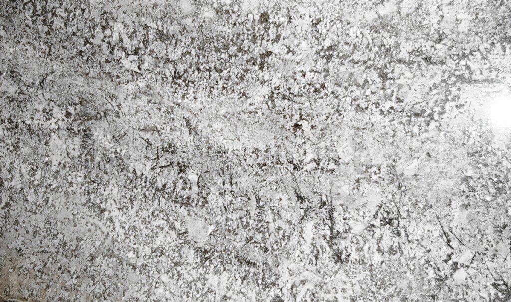 A close up of the concrete surface of a building