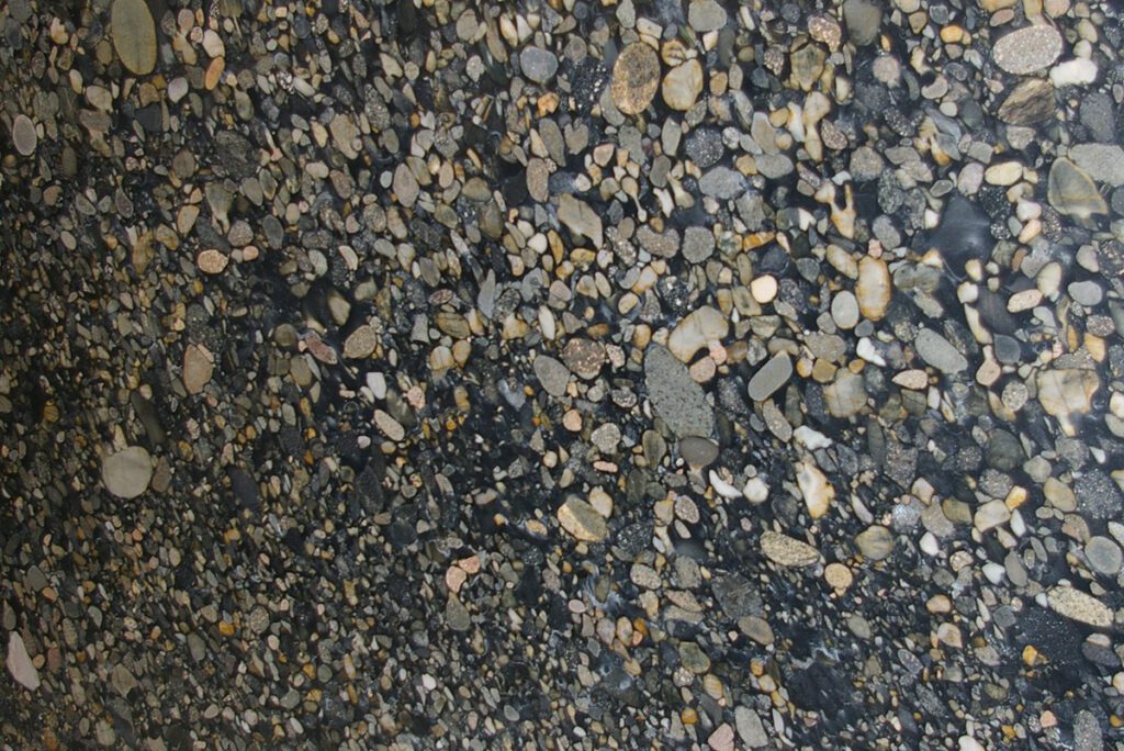 A close up of some rocks on the ground
