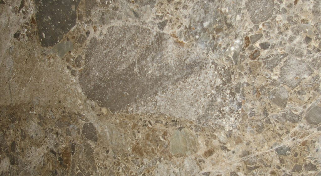 A close up of the surface of a stone floor