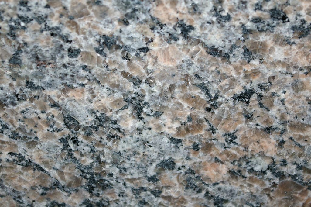 A close up of the granite surface of a counter top