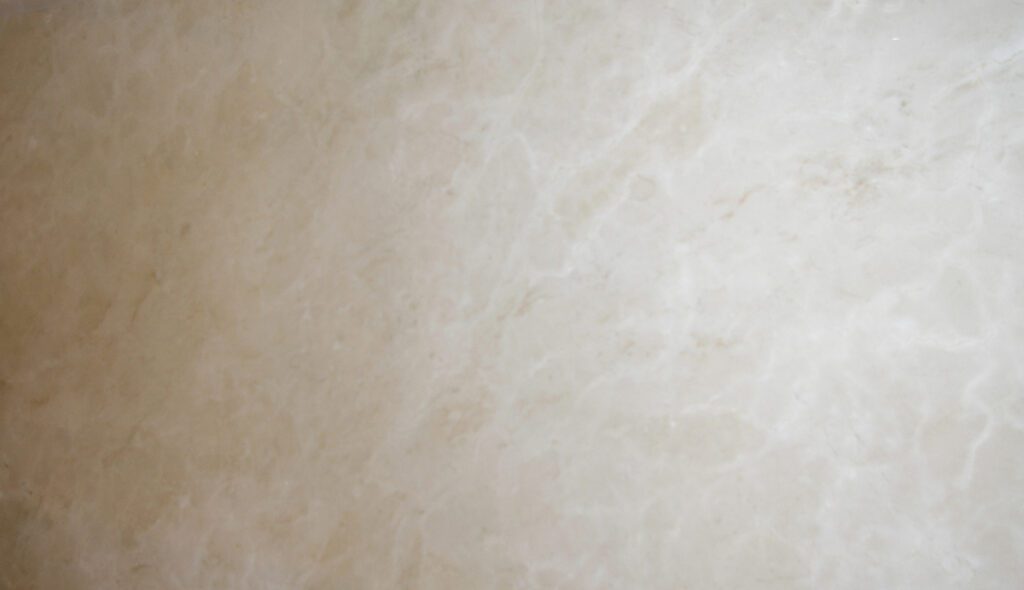 A white marble background with some light colored stains.