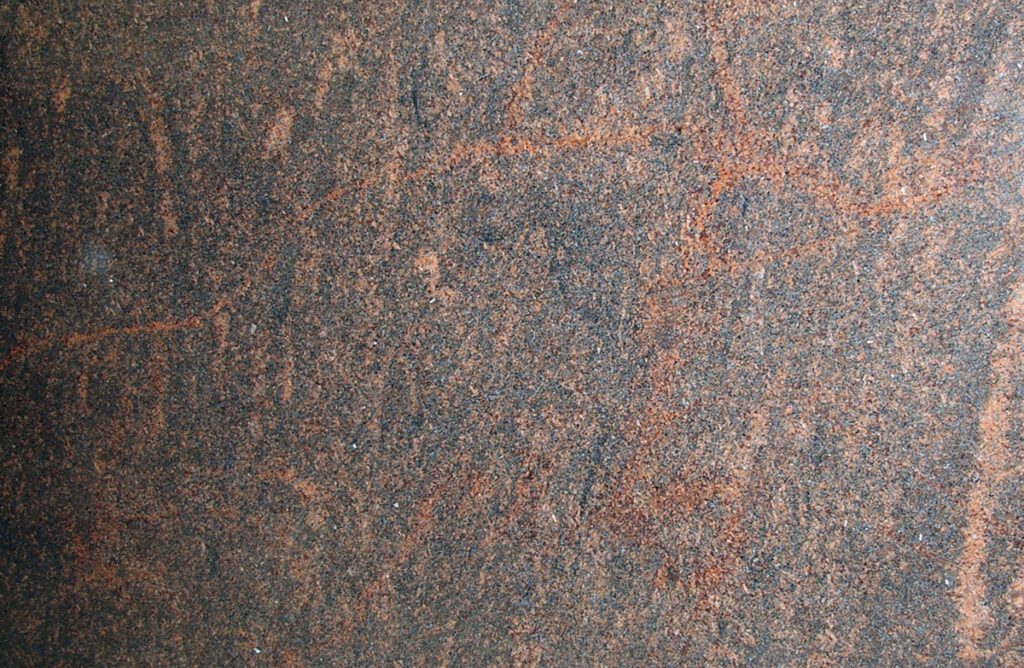 A close up of the surface of a stone slab.