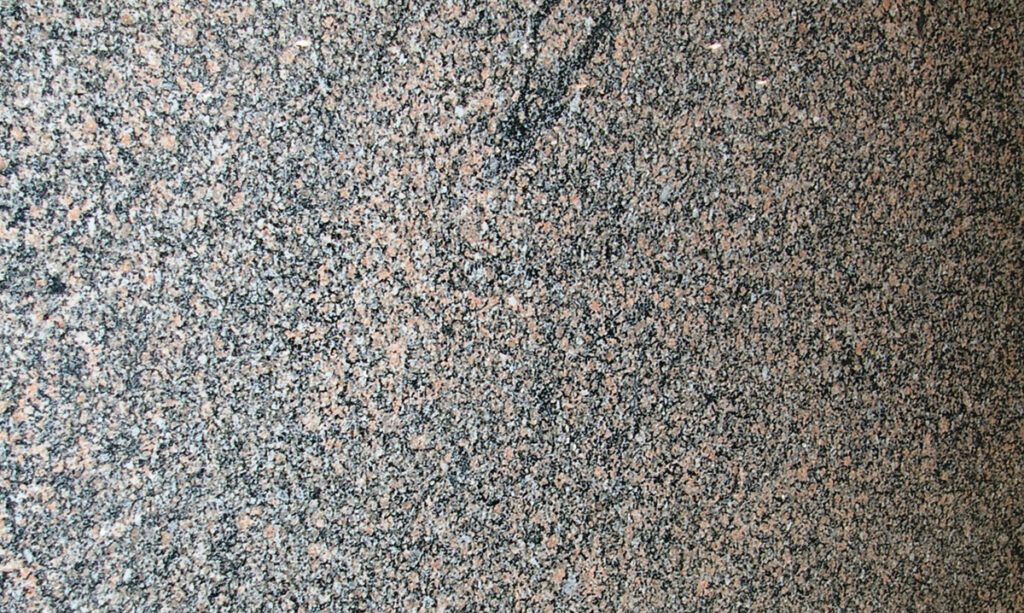 A close up of the ground surface of a stone floor.