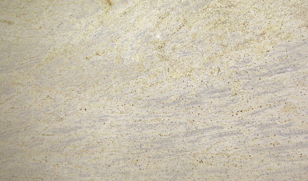 A close up of the surface of a white stone