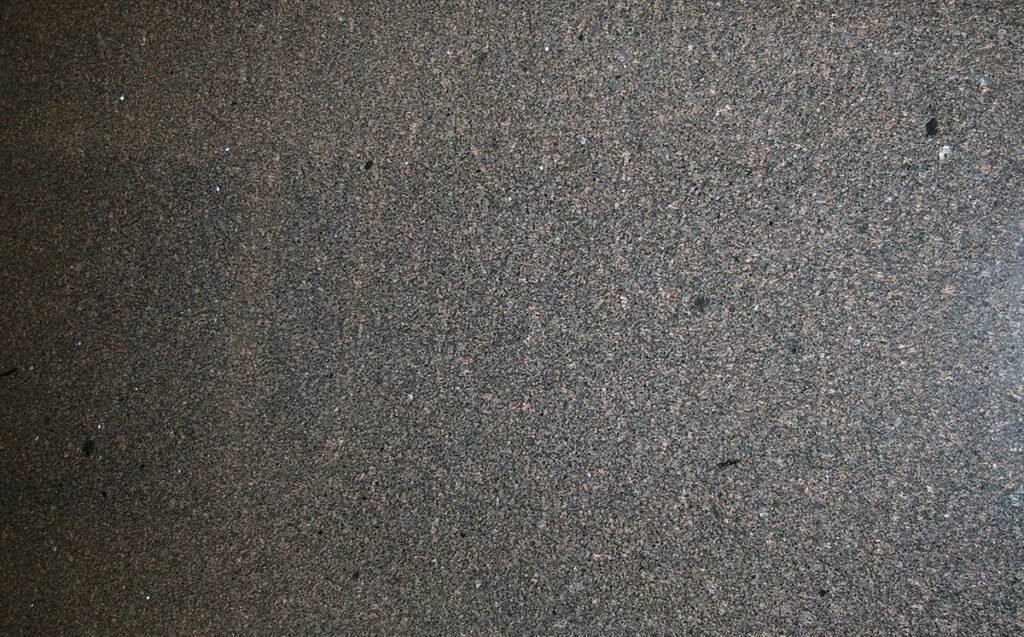 A close up of the surface of a concrete floor.
