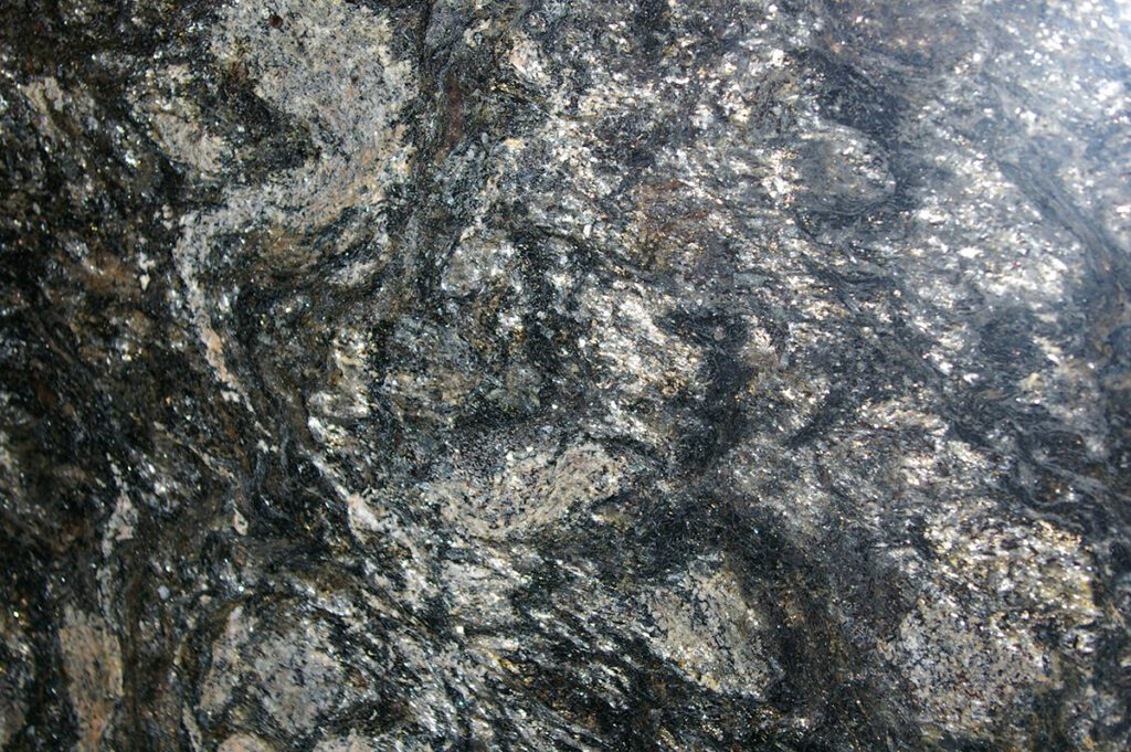 A close up of the surface of a rock