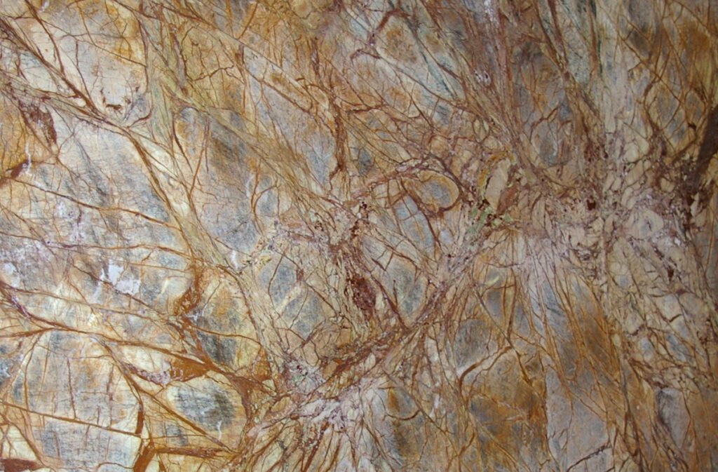 A close up of the brown and beige marble