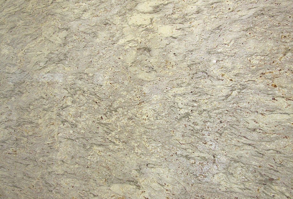 A close up of the surface of a stone wall.