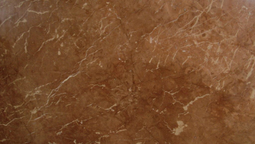 A close up of the brown marble surface
