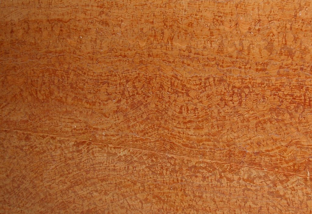 A close up of the wood grain on a surface.