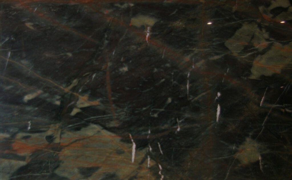 A close up of the dark marble surface