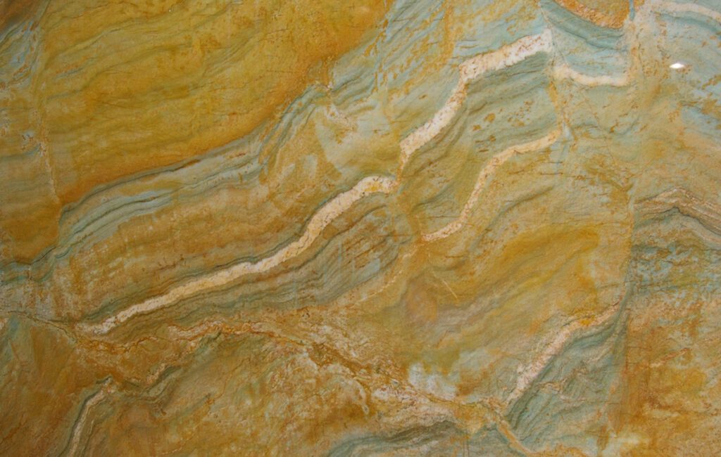 A close up of the yellow and green marble